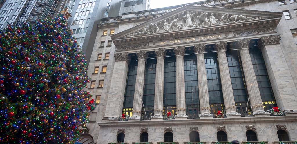 New York Stock Exchange building with a decorated Christmas tree in front